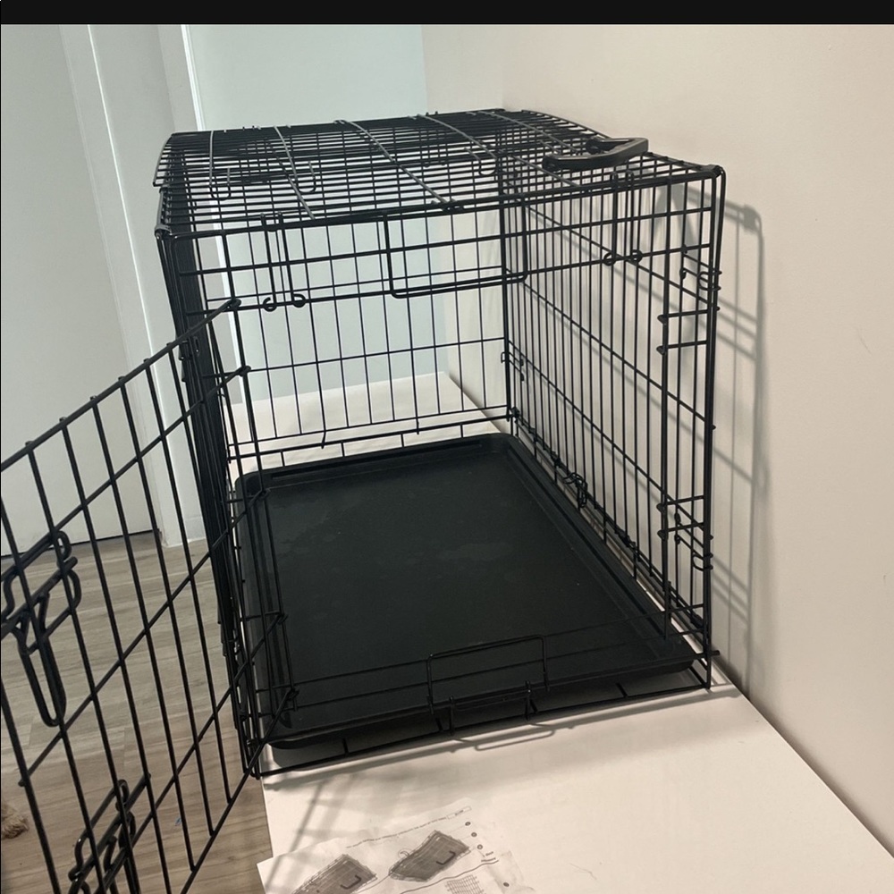 New dog crate for puppies to medium sized dogs
